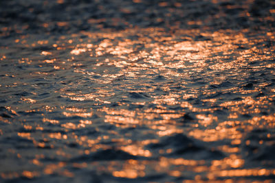 Surface level of sea shore during sunset