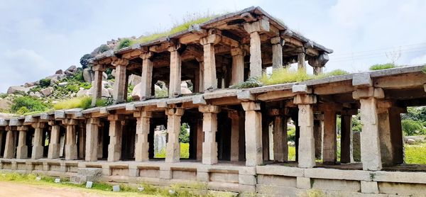 Low angle view of old ruin building against sky