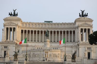 Low angle view of statue against sky