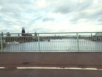 View of bridge against cloudy sky