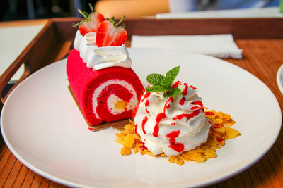 Close-up of cake served on table