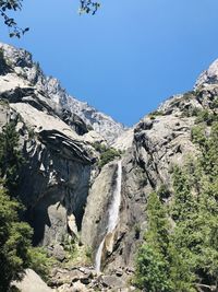 Scenic view of rocky mountains against clear sky