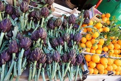 Various fruits on display at market stall