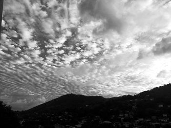 Low angle view of silhouette mountain against sky