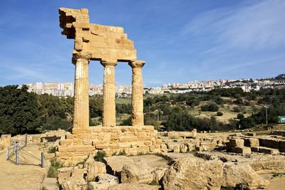 Ruins at the ancient city, modern city in the far background