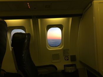 Low angle view of airplane flying over sea