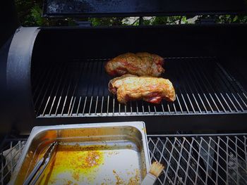 Close-up of meat on barbecue grill