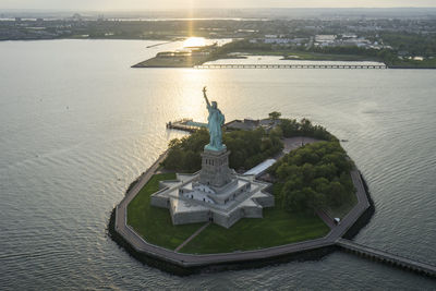 Aerial view of liberty island during sunset