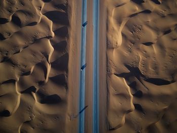 Aerial view of cars on road