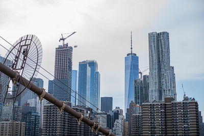 Low angle view of buildings against sky in city