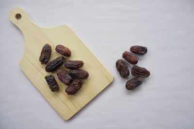 High angle view of food on table against white background