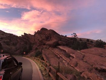  the last of the evening sun plays in the clouds as we sit by the red rocks. 