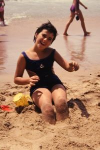 Happy young woman on beach