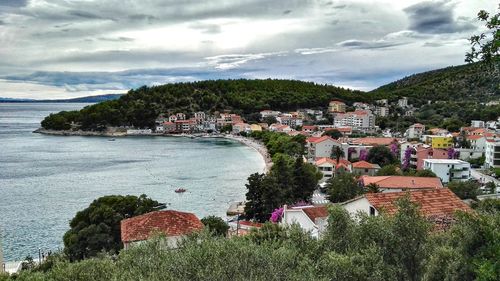 High angle view of town by sea