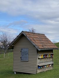 House on field against sky