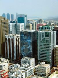 High angle view of buildings in city against sky