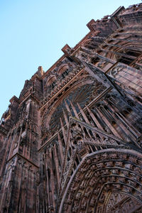 Low angle view of old building against sky