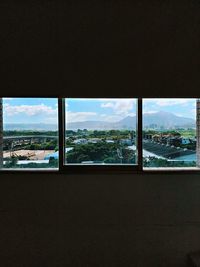 Buildings seen through window