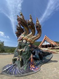 Sculpture of statue against sky