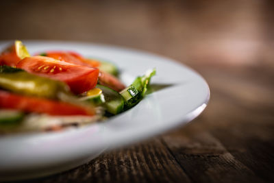 Close-up of fruit salad in plate on table