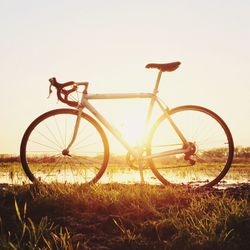 Close-up of bicycle against wall