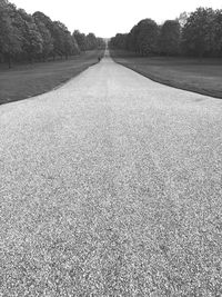 View of empty road on field