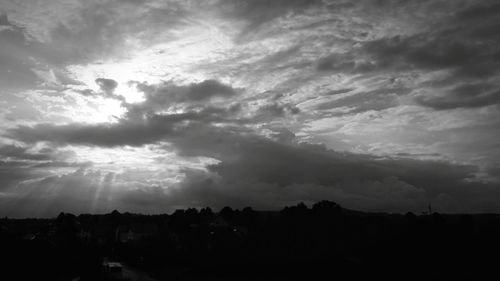 Scenic view of silhouette landscape against sky during sunset