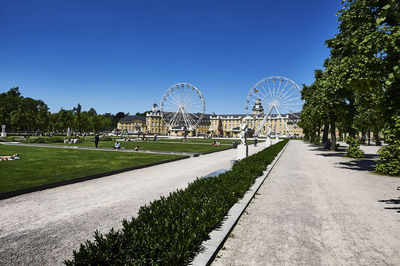 View of park against clear blue sky