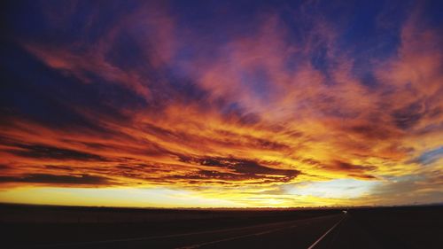 Scenic view of dramatic sky during sunset