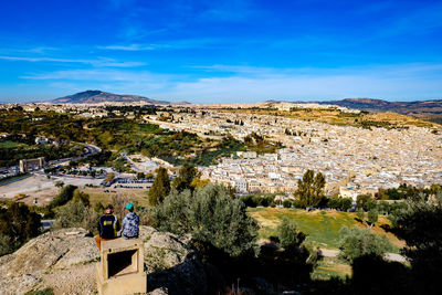 Scenic view of landscape against blue sky