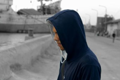 Man standing on road