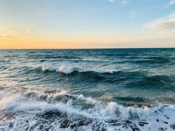 Scenic view of sea against sky during sunset