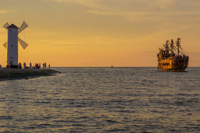 Scenic view of sea against sky during sunset