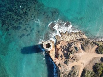 High angle view of wave in sea against sky