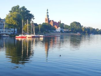 Boats sailing in river