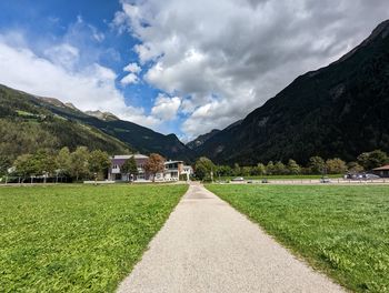 Scenic view of landscape and mountains against sky