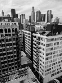 High angle view of buildings in city against sky