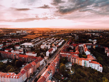 High angle view of city against cloudy sky