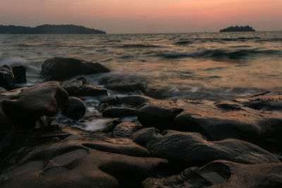 Scenic view of sea against sky during sunset