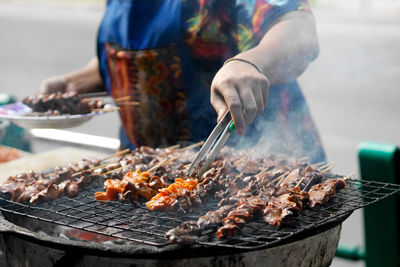 Close-up of meat on barbecue grill