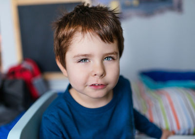 Portrait of cute boy at home