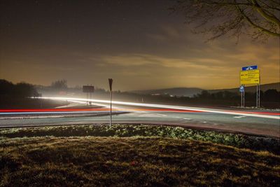 Light trails on road at night