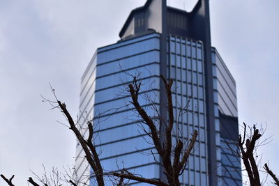 Low angle view of modern building against sky