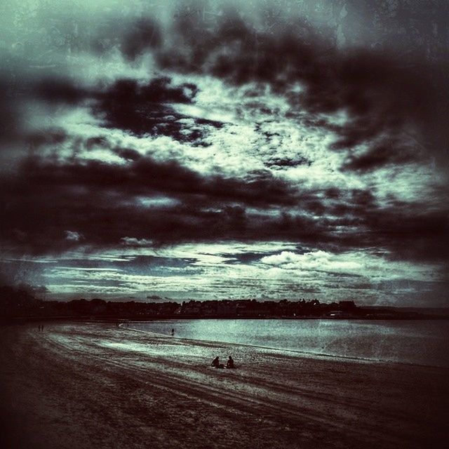 beach, sky, sea, water, cloud - sky, horizon over water, shore, cloudy, scenics, tranquil scene, tranquility, beauty in nature, sand, weather, nature, overcast, sunset, cloud, dusk, idyllic