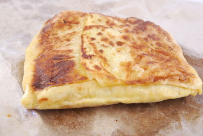 High angle view of bread on cutting board