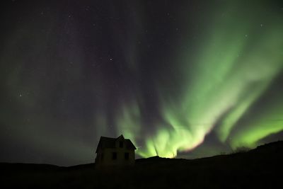 Low angle view of building against sky at night