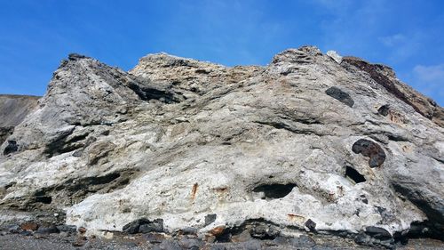 Rock formations against blue sky