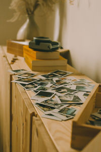 Close-up of open book on table at home