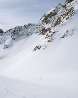 Snow covered mountain against sky