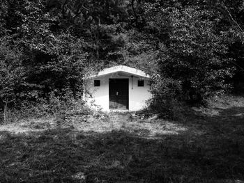 View of house with trees in background